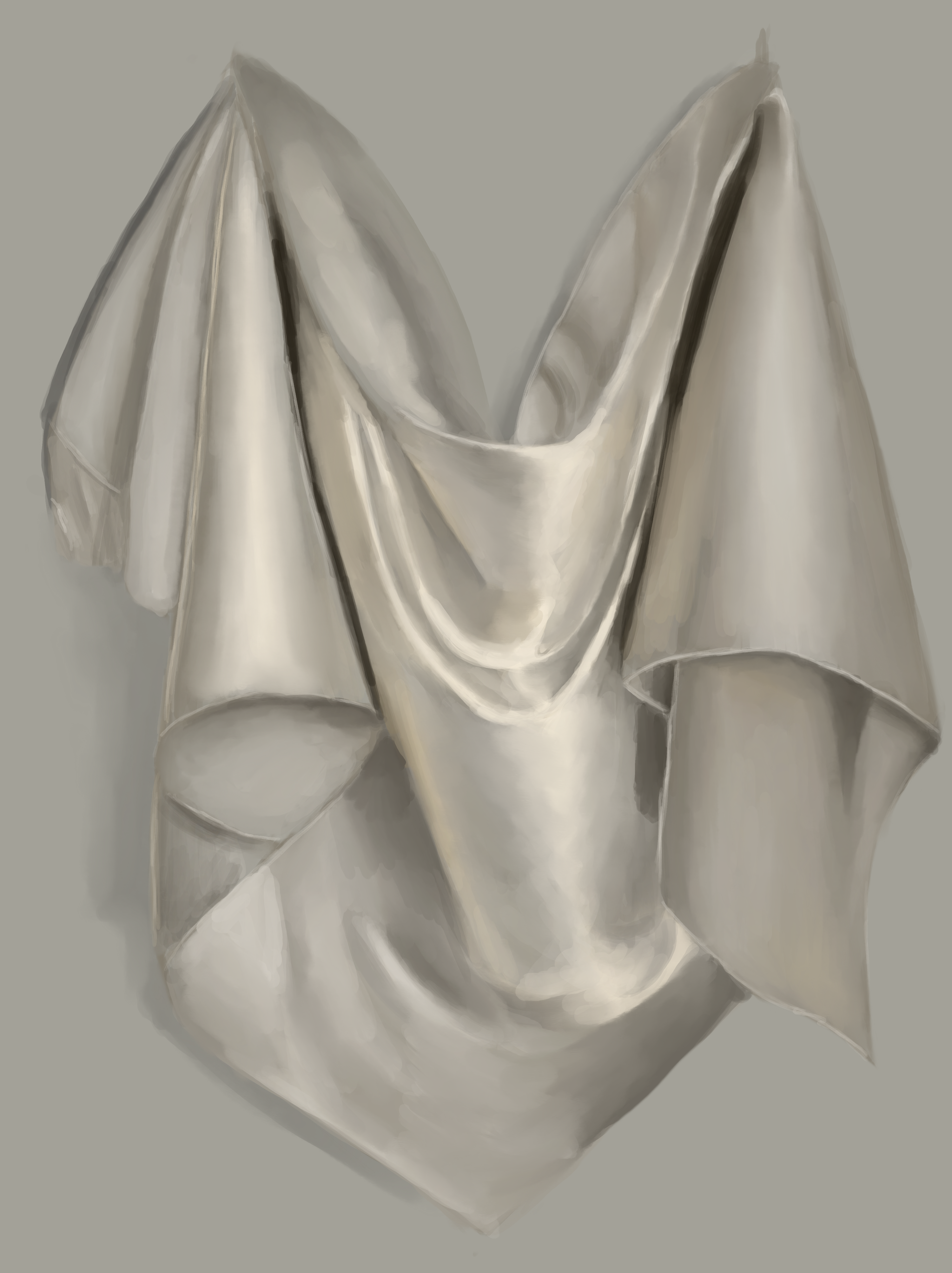 a cream colored cloth hanging on a wall